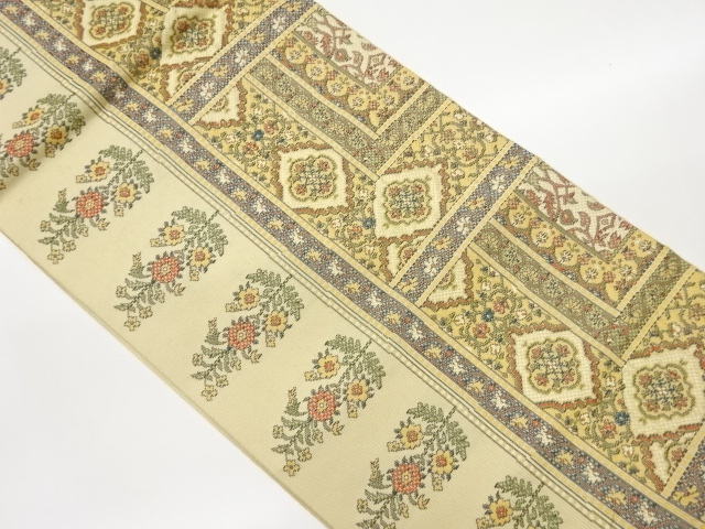 草花に華文・幾何学模様織出し名古屋帯